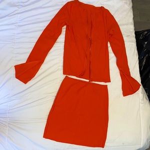 Orange skirt & zip up shirt. $15 | s:M